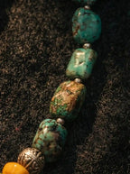 High-definition detail of raw natural turquoise stone beads showing organic texture