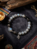 Misty Moonlight · Moonstone and Silver Obsidian Bracelet