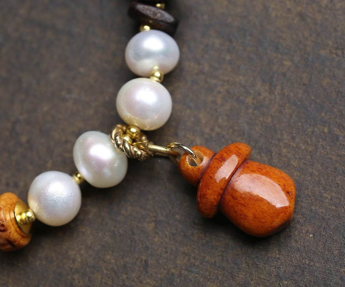 Lotus Treasury Pearl Bracelet